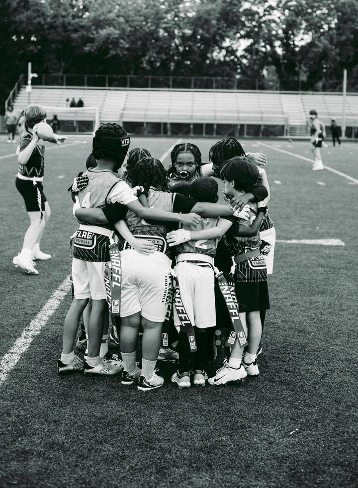 The team in a huddle before a game